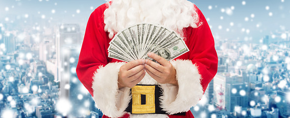 Image showing close up of santa claus with euro money