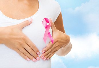 Image showing close up of woman with cancer awareness ribbon