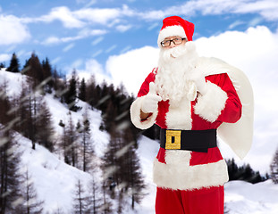 Image showing man in costume of santa claus with bag