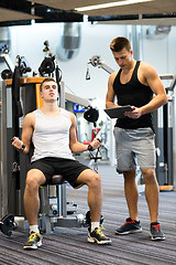 Image showing man exercising on gym machine