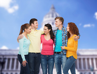 Image showing group of smiling teenagers showing ok sign