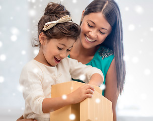 Image showing happy mother and child girl with gift box