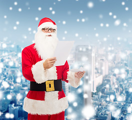 Image showing man in costume of santa claus with letter