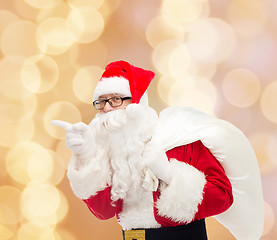 Image showing man in costume of santa claus with bag