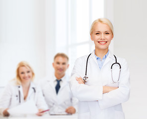 Image showing smiling female doctor with stethoscope