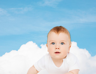 Image showing smiling baby looking up