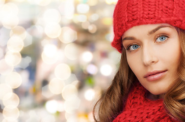 Image showing close up of smiling young woman in winter clothes