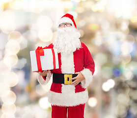 Image showing man in costume of santa claus with gift box