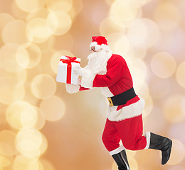 Image showing man in costume of santa claus with gift box