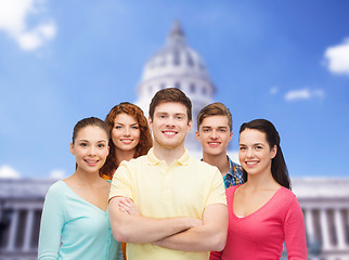 Image showing group of smiling teenagers showing ok sign