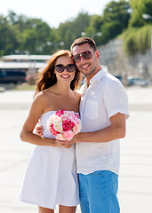 Image showing smiling couple in city