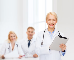 Image showing female doctor with stethoscope and tablet pc