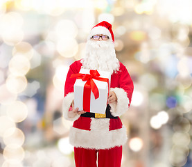 Image showing man in costume of santa claus with gift box