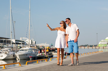 Image showing smiling couple in city