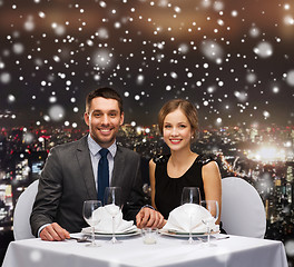 Image showing smiling couple at restaurant