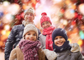 Image showing happy family in winter clothes outdoors