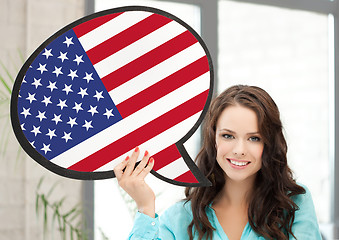 Image showing smiling woman with text bubble of american flag