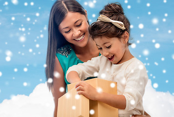 Image showing happy mother and child girl with gift box