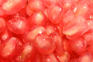 Image showing Photo of the juicy red pomegranate seeds