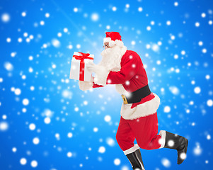 Image showing man in costume of santa claus with gift box