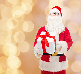 Image showing man in costume of santa claus with gift box