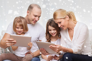 Image showing happy family with tablet pc computers