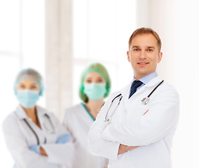 Image showing smiling male doctor with stethoscope