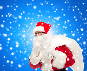 Image showing man in costume of santa claus with bag