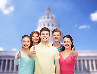 Image showing group of smiling teenagers showing ok sign