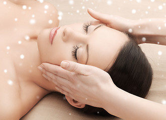 Image showing beautiful woman getting face or head massage