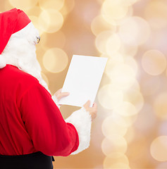 Image showing man in costume of santa claus with letter