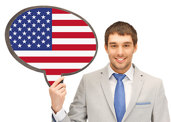 Image showing smiling man with text bubble of american flag