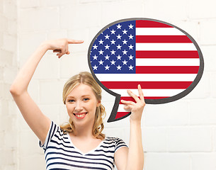 Image showing smiling woman with text bubble of american flag