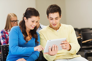 Image showing group of smiling students with tablet pc