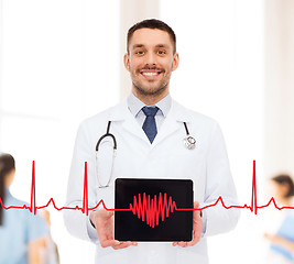 Image showing smiling male doctor with tablet pc