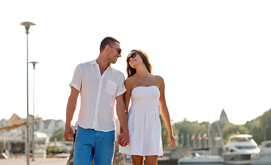 Image showing smiling couple in city