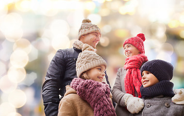 Image showing happy family in winter clothes outdoors