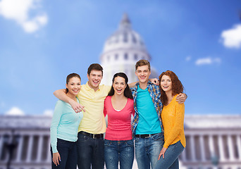 Image showing group of smiling teenagers showing ok sign