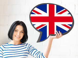 Image showing smiling woman with text bubble of british flag