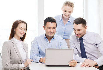 Image showing business team working with laptop in office