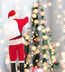 Image showing man in costume of santa claus with bag