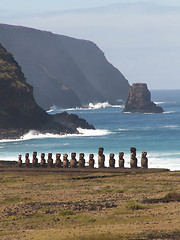 Image showing Row Of Moai Against The Ocean