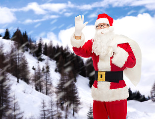 Image showing man in costume of santa claus with bag