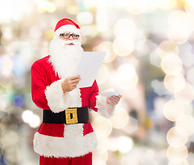 Image showing man in costume of santa claus with letter