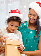 Image showing happy mother and child girl with gift box