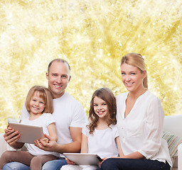Image showing happy family with tablet pc computers