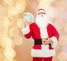 Image showing man in costume of santa claus with euro money