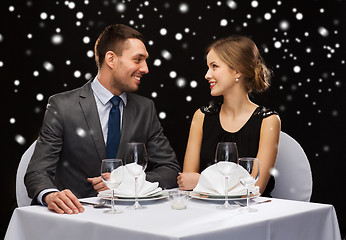 Image showing smiling couple at restaurant