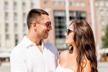 Image showing smiling couple in city