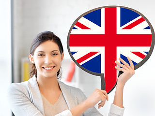 Image showing smiling woman with text bubble of british flag